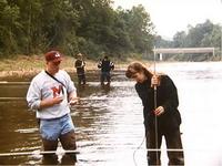 Photo of students measuring streamflow
