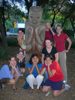 participants and statue, Stanford campus