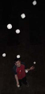 Peter Bone juggling 9 balls, photo by Luke Burrage