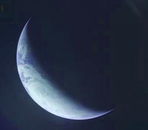 A crescent of earth photographed by an astronaut