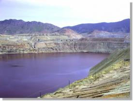 The notorious Berkeley Pit a defunct open pit copper mine in Butte Montana