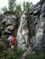 People examine fractured rock