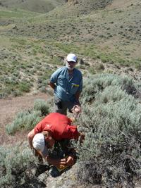 Darrell and student in the field