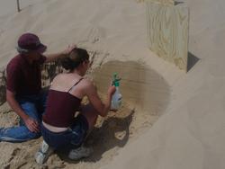 Undergraduate research student learning how to make sediment peels