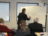 Tracy Santa taking notes on group brainstorming