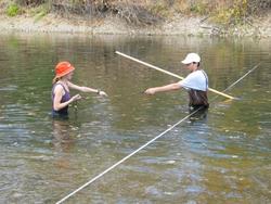 Students measure discharge in the Cannon River