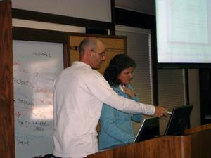 program assessment workshop participants making a logic model