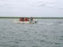 William and Mary geology students in a boat