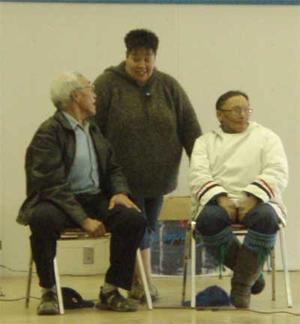 elders speaking at meeting