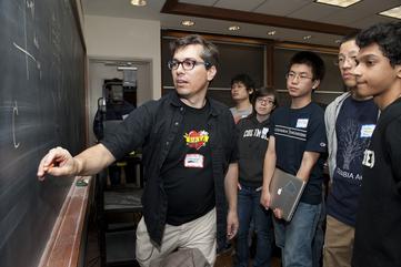 Students at blackboard