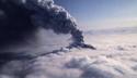 Volcanic ash erupting into the atmosphere.