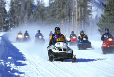 Snowmobiles with guide