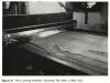 Flow coating machine to apply solvents to hides at the Riley Tannery